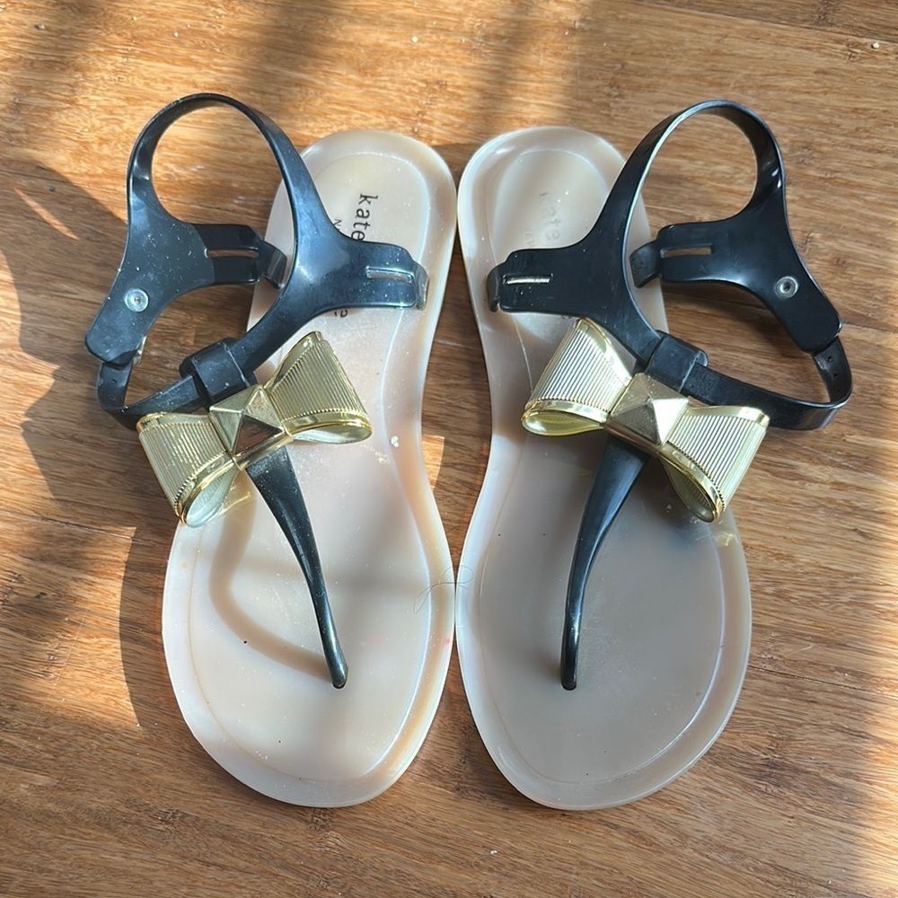 Kate Spade Black and Gold Bow Jelly Sandals